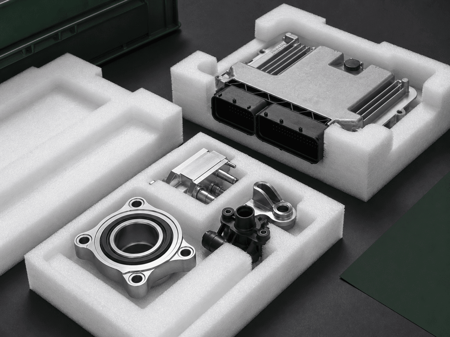 Automotive control unit and components protected by EPE foam trays