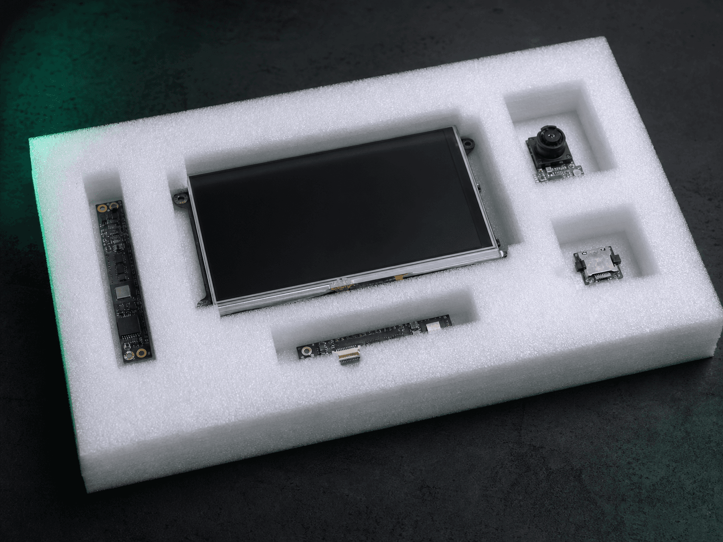 Electronic display and circuit components protected in a custom EPE foam insert
