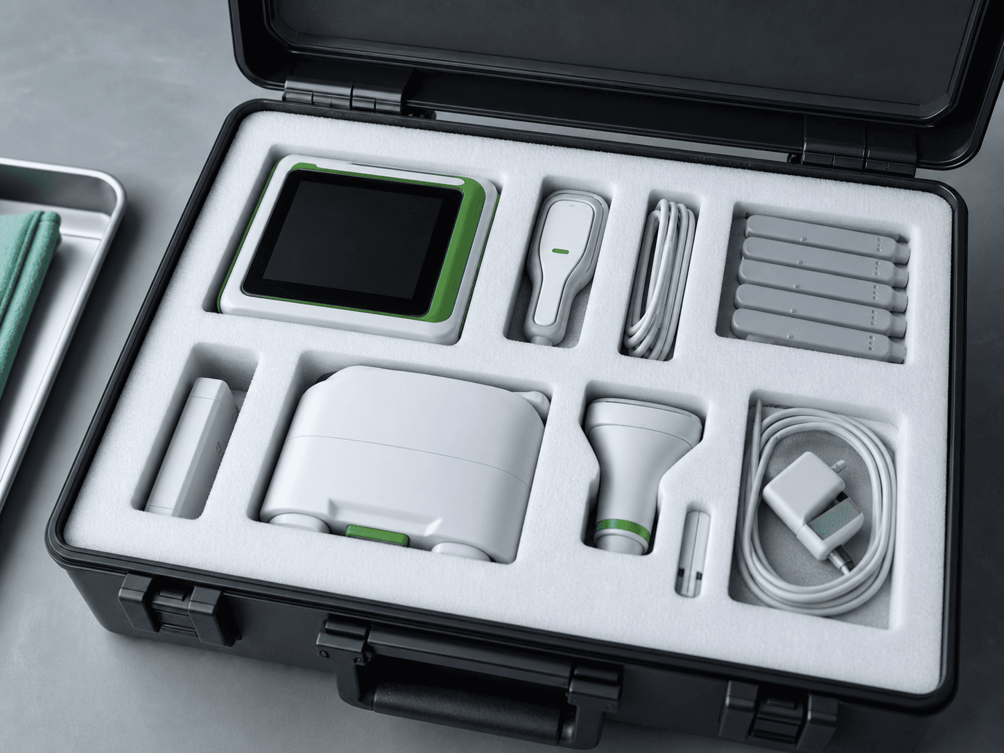 Medical diagnostic equipment organized in a precision-cut EPE foam case
